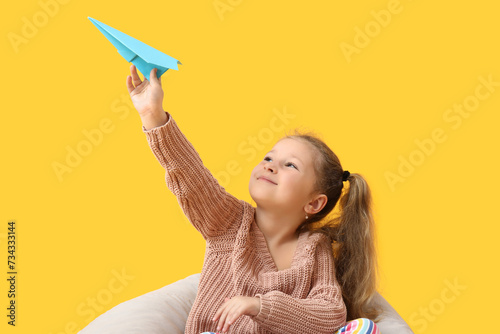 Cute little girl with paper...