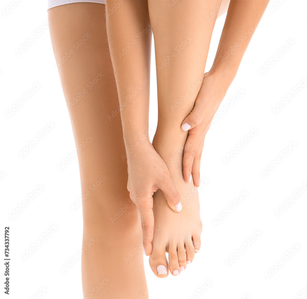 Beautiful young woman making foot massage on white background Beautiful young woman making foot massage on white background