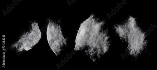 Set absorbent cotton wool pads, swabs, wadding isolated on black, clipping path photo