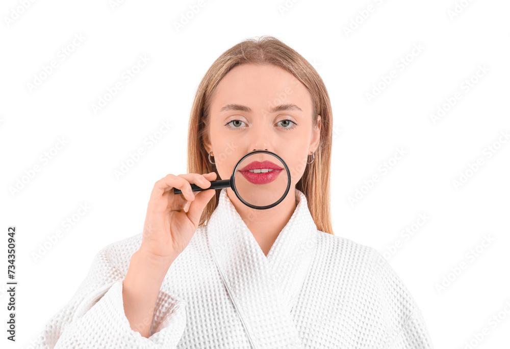 Beautiful young woman with magnifying glass on white background. Lips enhancement Beautiful young woman with magnifying glass on white background. Lips enhancement