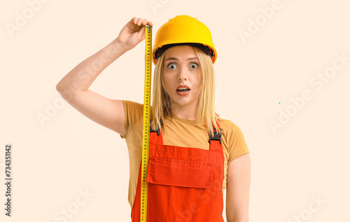 Surprised female worker in ...