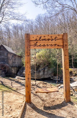Glade Creek Grist Mill and Waterfall in West Virgina During a Sunny Spring Day