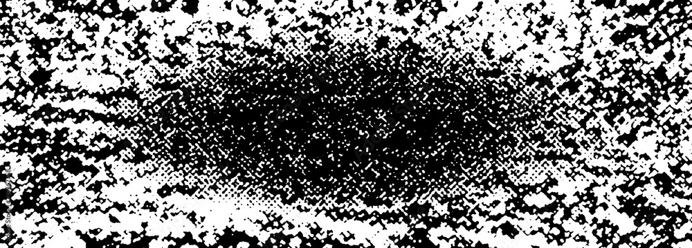 Fototapeta premium An abstract black and white halftone grunge texture background image.