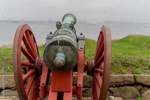 The old cannon is pointed towards the sea.