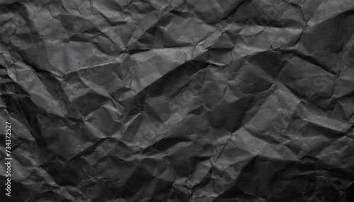 Black crumpled paper texture background. Copy space for your text