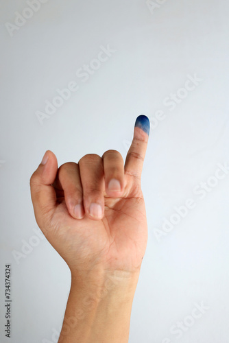Close Up of Hand Gesture Little Finger After Voting.