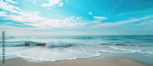 Tranquil Beach with Waves and Blue Sky © evening_tao