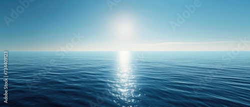 Serenity at Sea: Sunrise Over Calm Ocean Waters