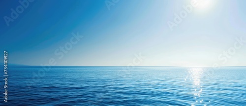 Tranquil Blue Seascape with Shimmering Sunlight