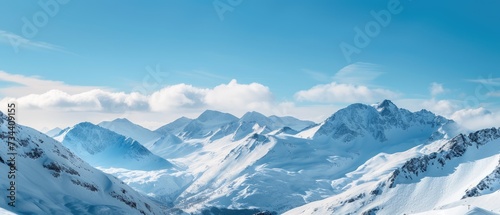 Serene Snowy Mountain Landscape Under Blue Sky