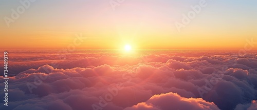 Majestic Sunrise Over a Sea of Clouds