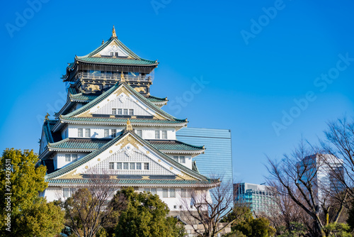 Landscape view Osaka s landmark Osaka Castle castle tower that shines in the blue sky  Osaka Japan.