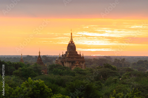 Aerial top view of burmese temples of Bagan City from a balloon, unesco world heritage with forest trees, Myanmar or Burma. Tourist destination.