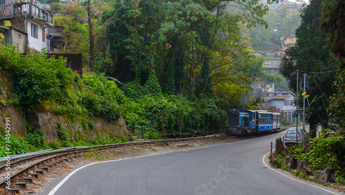 Cuadro en lienzo View of  city road of Darjeeling hill station with view of toy train