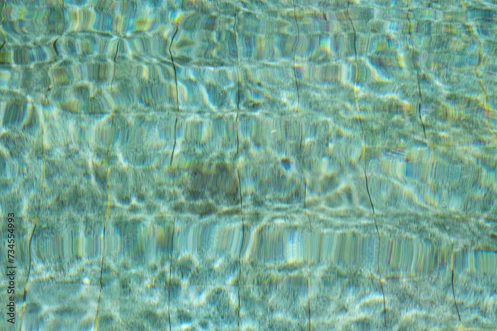 Water in swimming pool reflecting sunshine. Water in swimming pool reflecting sunshine.