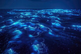 A captivating scene of a swarm of glowing krill illuminating the ocean's depths