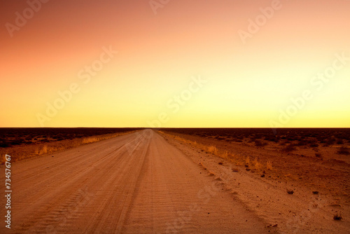Evening in the Australian Outback, dirt road near Coober Pedy photo
