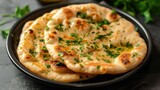 Indian naan bread on a plate, flatbread adorned with parsley and spices, Ai Generated.