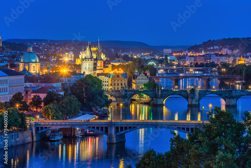 Prague Czech Republic, high angle view night city skyline at Charles Bridge and Vltava River, Czechia photo