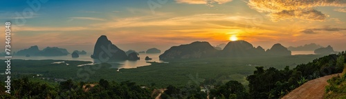 Tropical islands sunrise view at Samed Nang Chee viewpoint with bay to sea ocean, Phang Nga Thailand nature landscape panorama