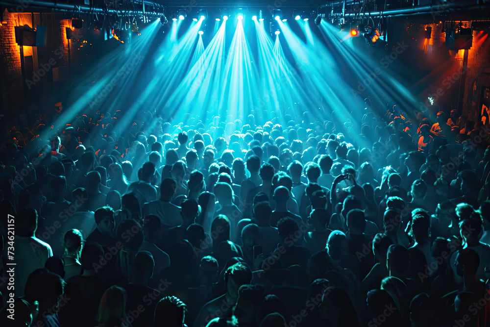 close up Crowded dancefloor in night club.Full nightclub during musical concert show - obrazy, fototapety, plakaty 