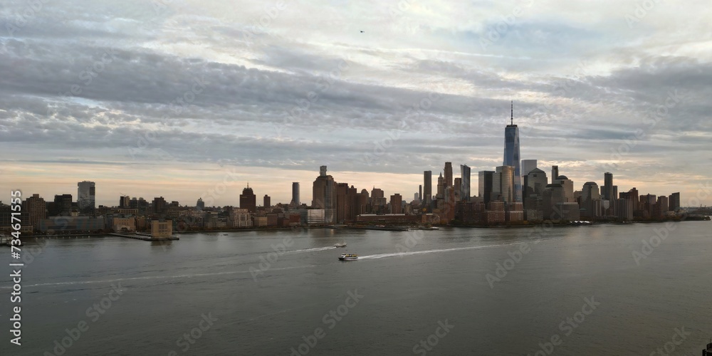 Fototapeta premium New York skyline. Manhattan view from New Jersey, New York skyscraper. Aerial view of Big Apple. New York panorama from Hudson. Cityscape landmark. Lower Manhattan NY.