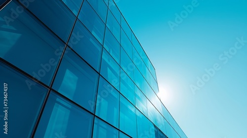 Modern Glass Building Facade Reflecting Bright Sunlight
