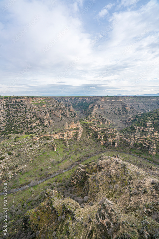 Ulubey Canyon is a nature park in the Ulubey and Karahallı of Uşak, Turkey. The park provides suitable habitat for many species of animals and plants and is being developed as a centre for ecotourism.