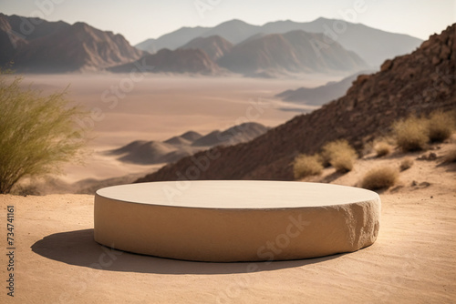 Empty round stone podium and pedestal stand platform for display product in desert with rock mountain