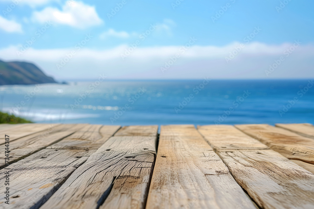 Wooden table top with blurred seascape background. For montage product display.