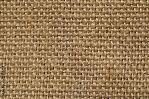 Texture of beige fabric as background  top view