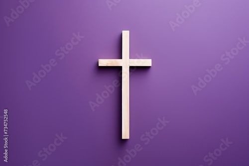 Simple stone cross on a purple background, symbolizing faith and solemnity