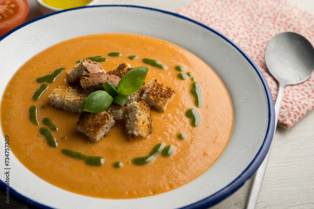 Spanish tomato soup with basil oil. Spanish tomato soup with basil oil.
