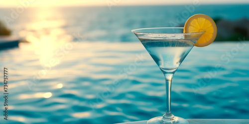 Elegant cocktail martini tonic on the pool deck