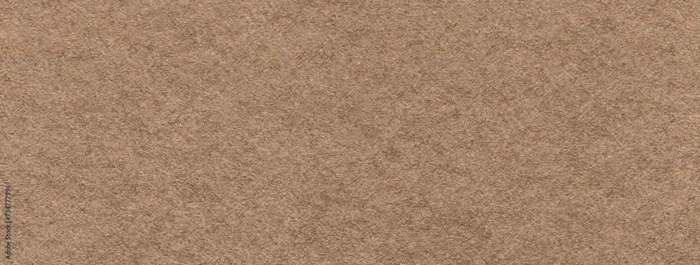 Fototapeta premium Texture of craft brown paper background colors, macro. Structure of vintage kraft umber cardboard.