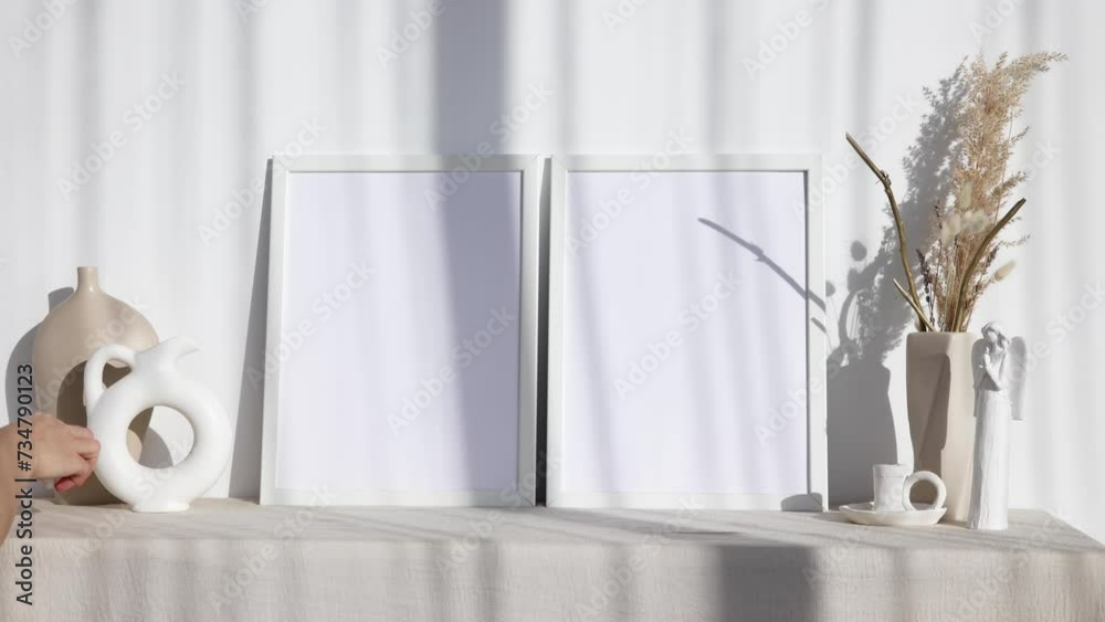 Video photo frames mockup with white vase and dry flowers Video photo frames mockup with white vase and dry flowers