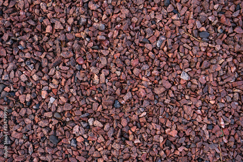 Red crushed stone, horizontal background for design