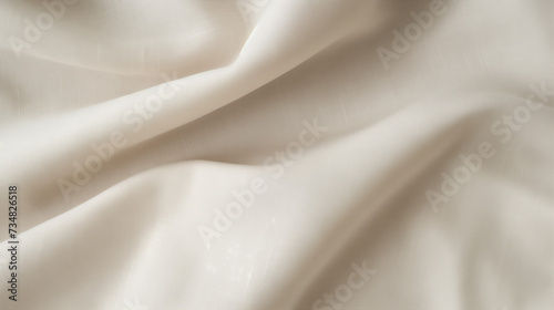 Tela de lino color crema con doblez, fondo texturizado photo