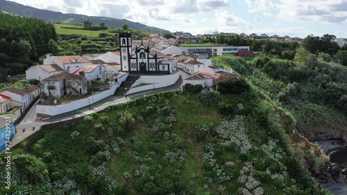 Wallpaper Mural Beautiful landscapes of the Azores. Aerial view. Cinematic blue lakes, green mountains, tropical island nature. Aerial shot, drone point of view rocky coastline, Atlantic Ocean. Travel and nature. Torontodigital.ca