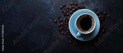 Top View of Coffee Cup Surrounded by Beans