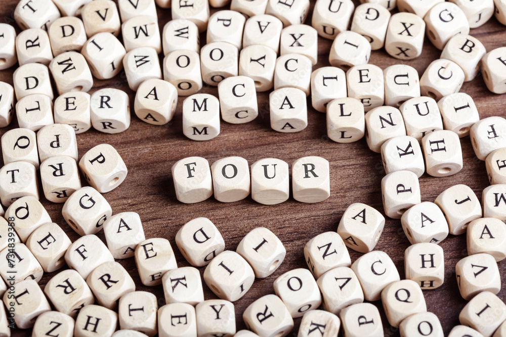Number Four spelled out, letter dices word