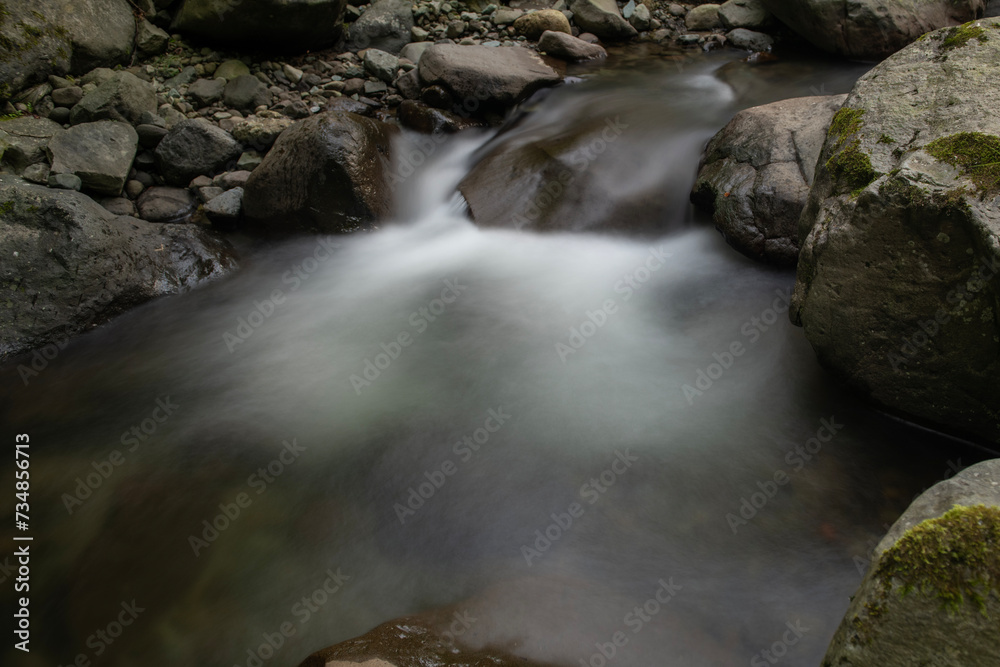 Waterfall. Long exposure waterfall photo. Transference. Long exposure. Long exposure photo of smooth waterfall flowing down steps. Rize, Türkiye. Waterfall. Long exposure waterfall photo. Transference. Long exposure. Long exposure photo of smooth waterfall flowing down steps. Rize, Türkiye.