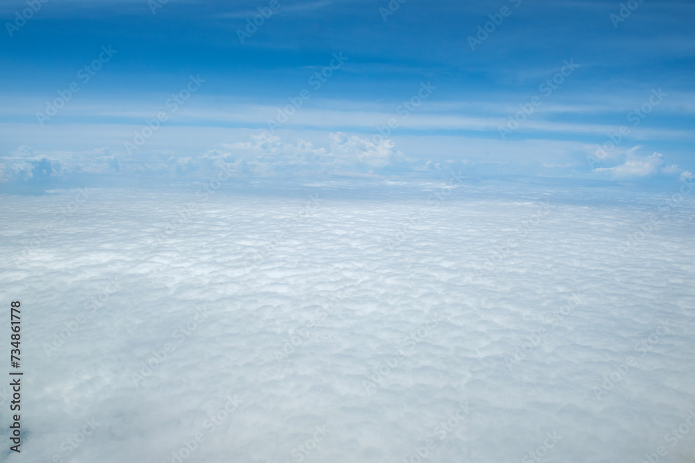 View of clouds in the sky from the plane, sky background.