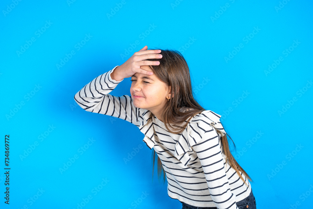 Fototapeta premium A very upset and lonely Young beautiful teen girl wearing striped T-shirt crying,