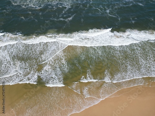 Waves Crashing on the Sandy Beach