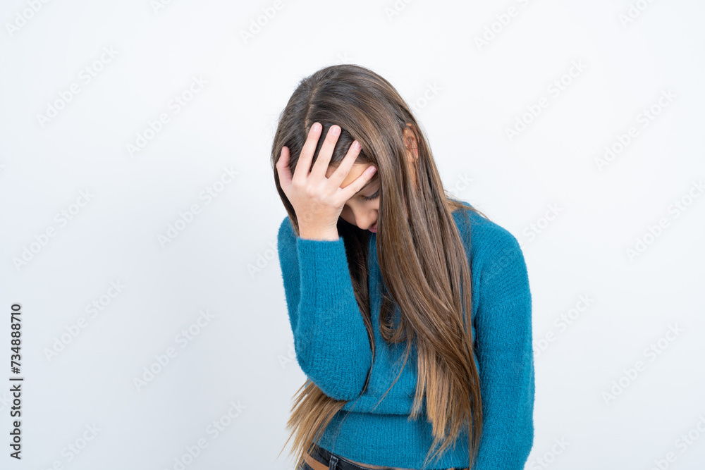 A very upset and lonely beautiful kid girl wearing blue sweater crying, A very upset and lonely beautiful kid girl wearing blue sweater crying,