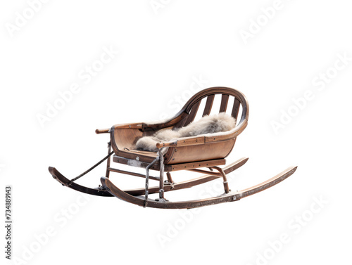 a wooden sleigh with a white fur on it