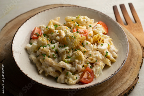 Macaroni cooked with cream, cheese and baked cauliflower.