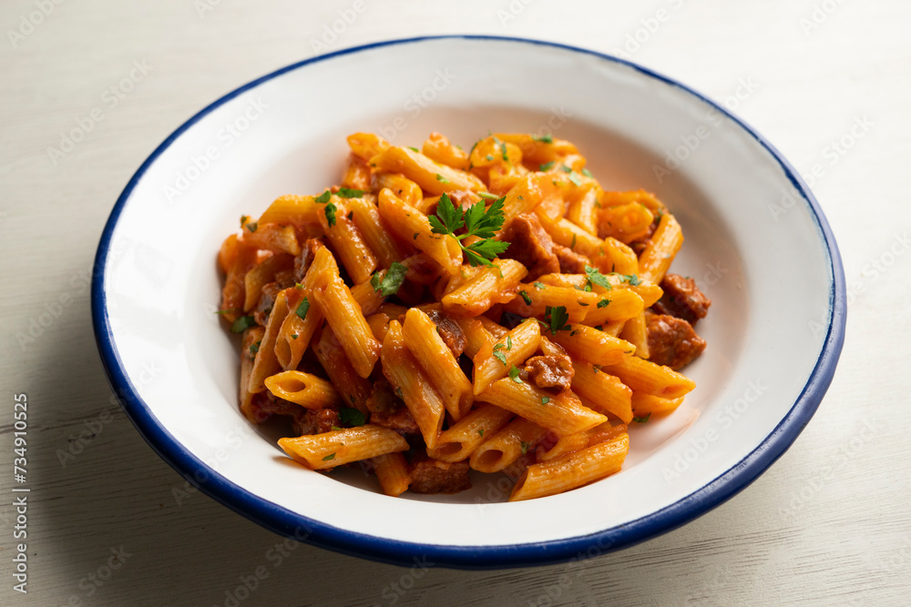 Macaroni dish with tomato sauce and Spanish chorizo. Macaroni dish with tomato sauce and Spanish chorizo.
