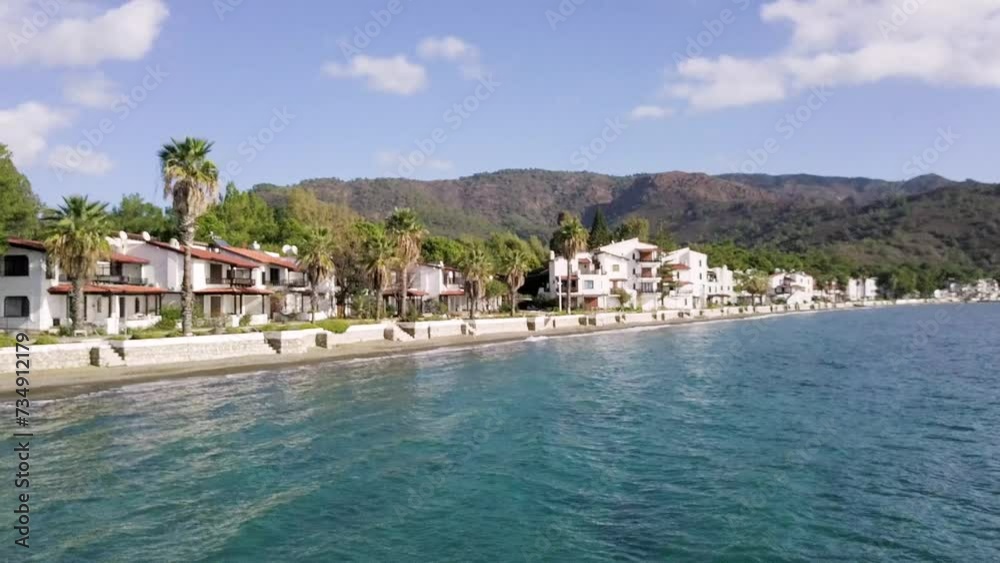 Coastal Charm: Drone Video of Scenic Small Town on the Beach Coastal Charm: Drone Video of Scenic Small Town on the Beach